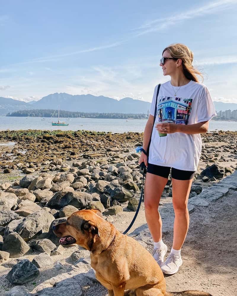 woman and dog at kitsilano beach