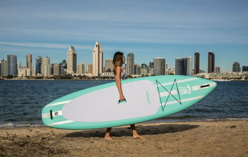 Woman surfing in San Diego