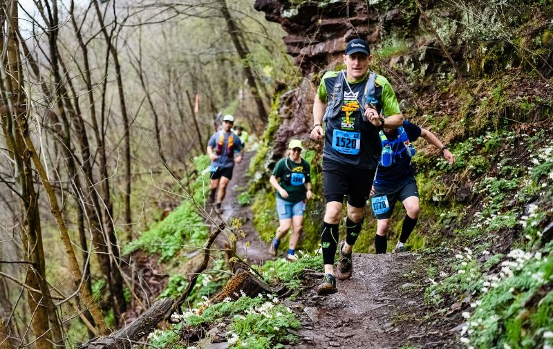Men doing a trail run at Denver run club
