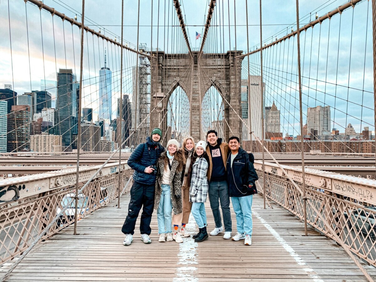 People standing at a bridge New York City