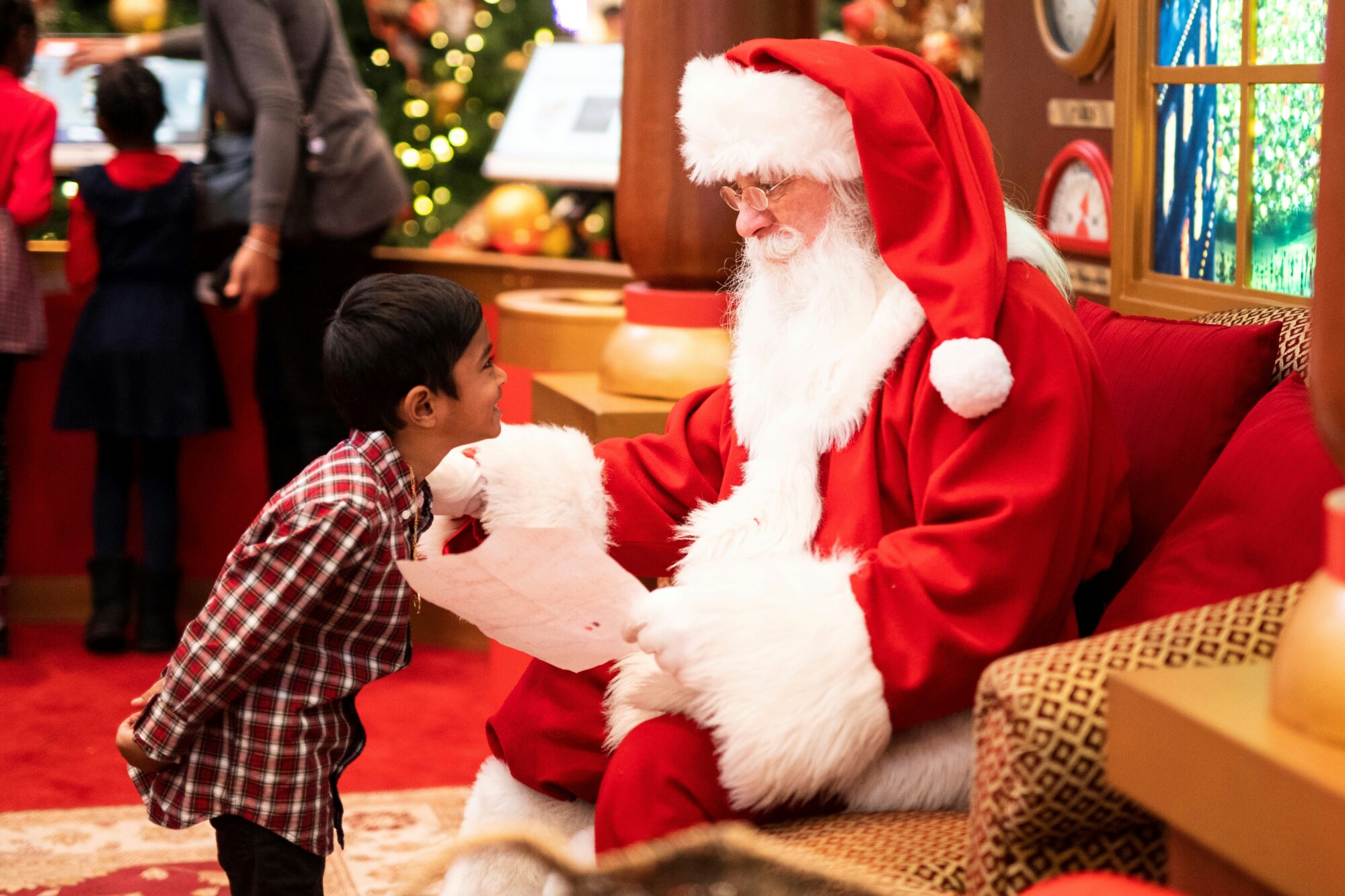 Child and Santa Claus talking
